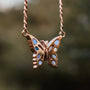 "Fritillary Necklace", a delicate butterfly necklace in rose gold with nacre accents.