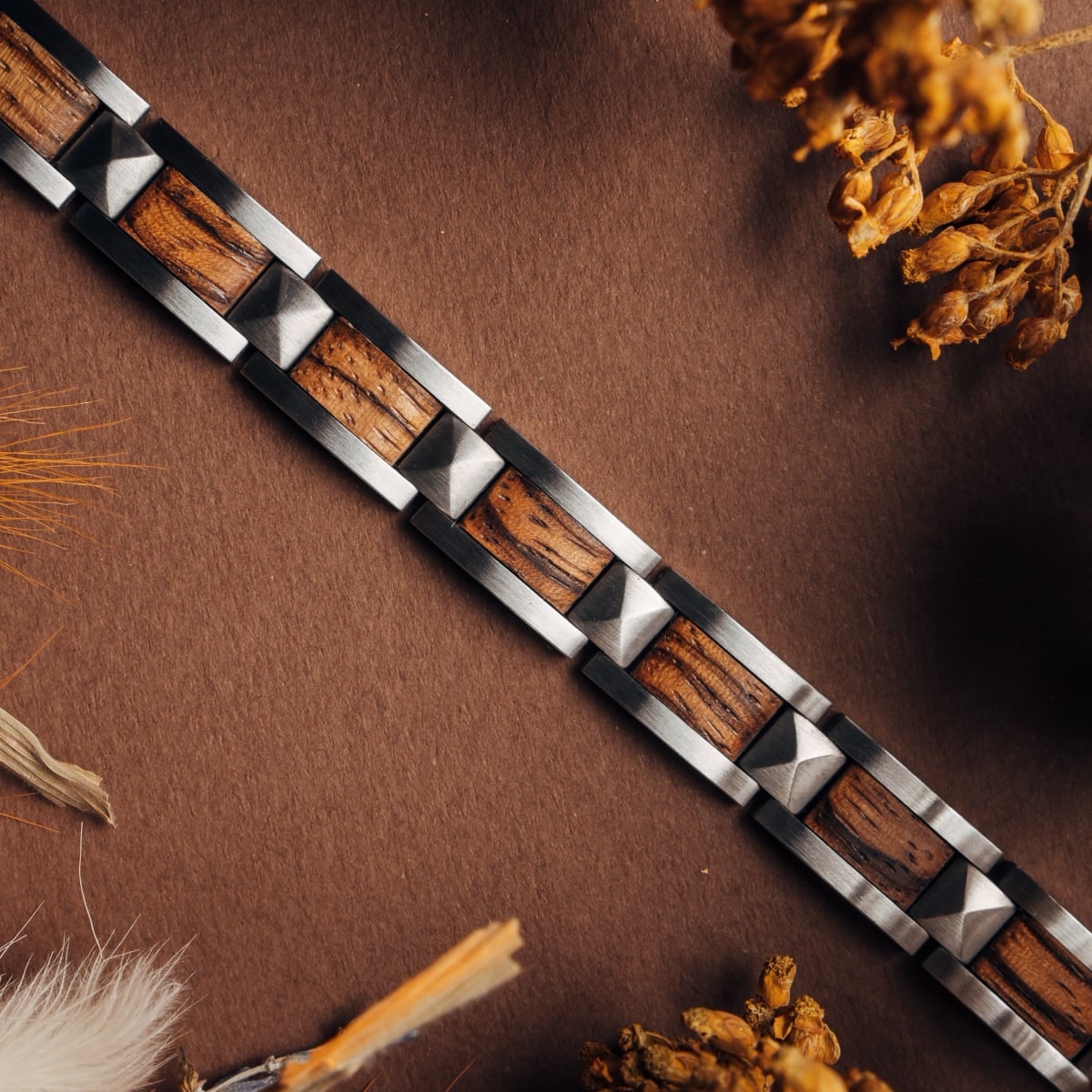 "Rhapsody" bracelet featuring zebrawood and silver for a sleek, natural look with geometric detailing.