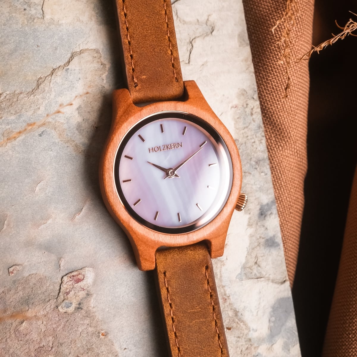 "Cinque Terre watch featuring cherrywood and nacre materials, with a minimalist and natural design."