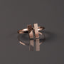 "Campania Ring", a stylish walnut and rose gold ring with a modern geometric design.