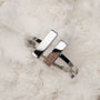 "Campania Ring" - A modern ring with walnut and silver accents in a minimalist design.