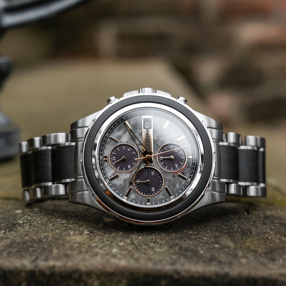 Orologio "Cairo" con un design raffinato in marmo e acero con uno stile elegante e moderno.