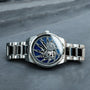 "Spikes watch with Lapis Lazuli and Maple materials, featuring a sleek and sophisticated design."
