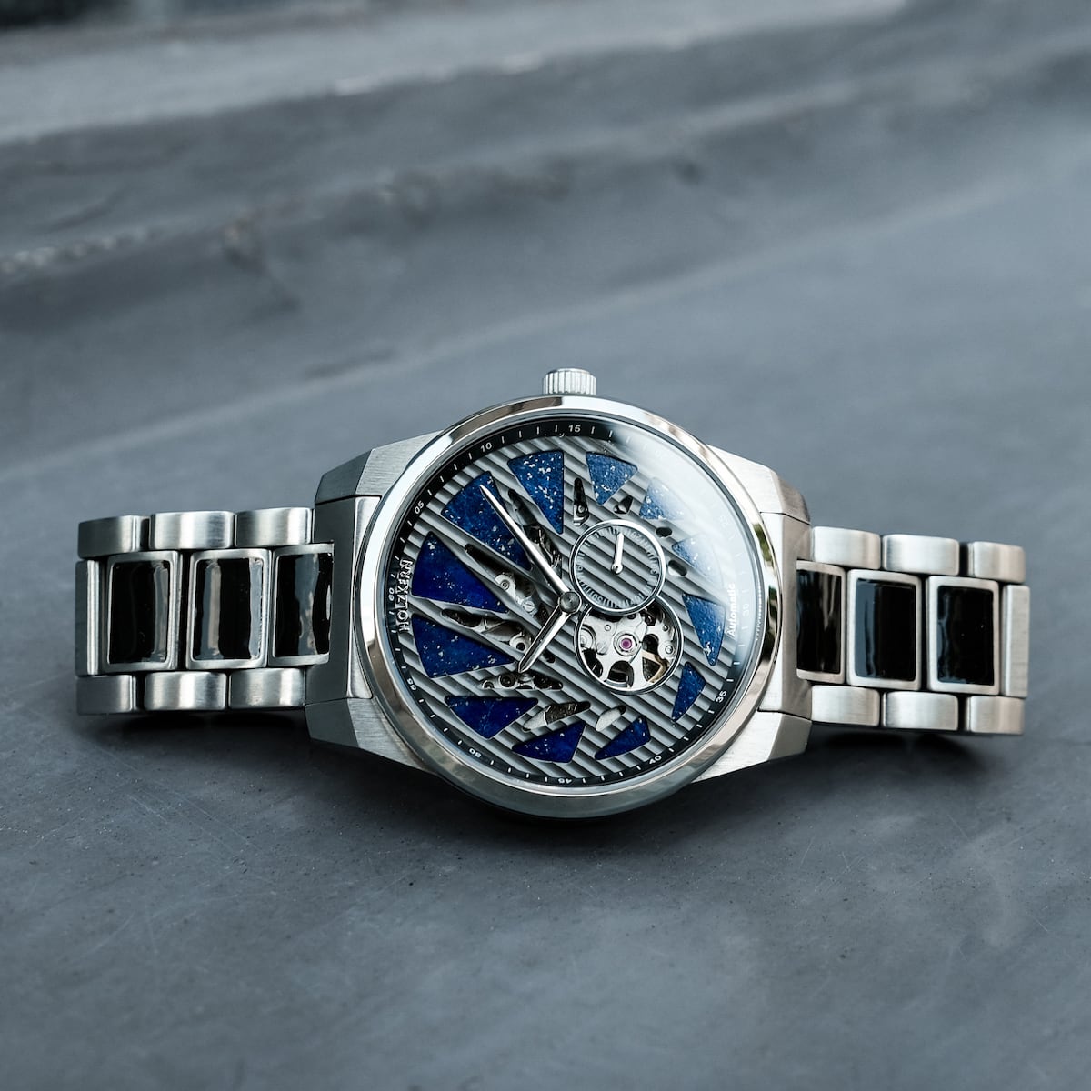 "Spikes watch with Lapis Lazuli and Maple materials, featuring a sleek and sophisticated design."