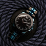 Orologio da polso "Glaciersurge" con un design elegante con la faccia dell'occhio di Hawk e accenti dell'acero.