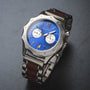 "Osprey watch featuring a vibrant azure blue dial and sleek metallic band for a modern style."