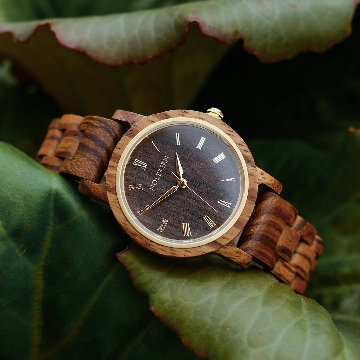 "Earth" wooden watch with zebrawood and maple elements, showcasing a natural and elegant design.