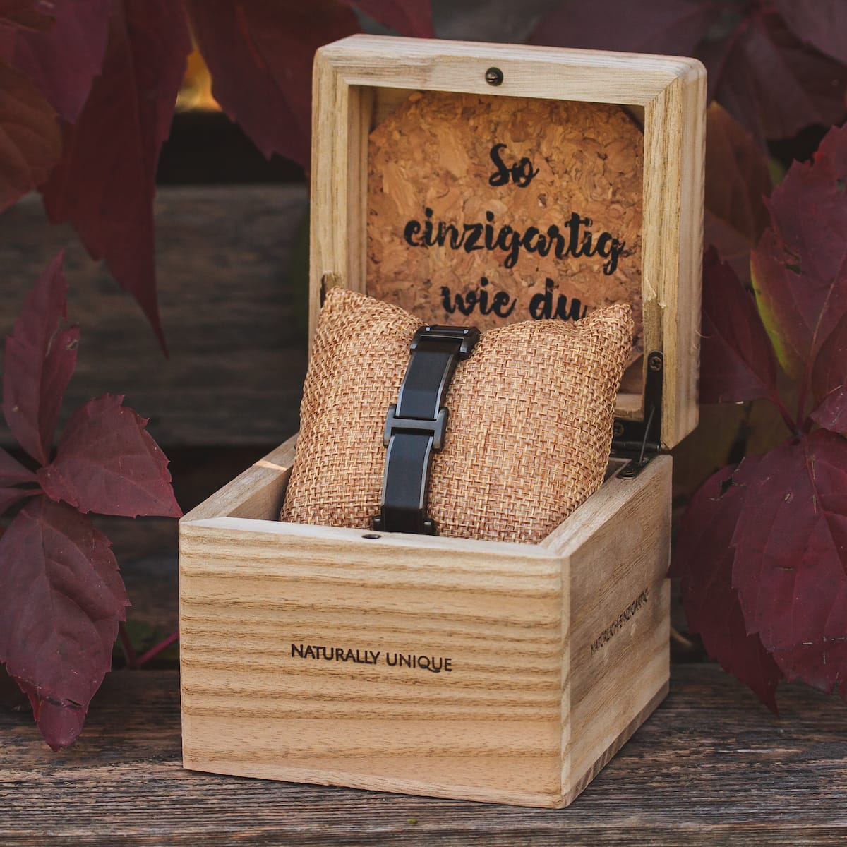 "Acapella", a stylish watch, in a wooden box with a rustic, natural design.