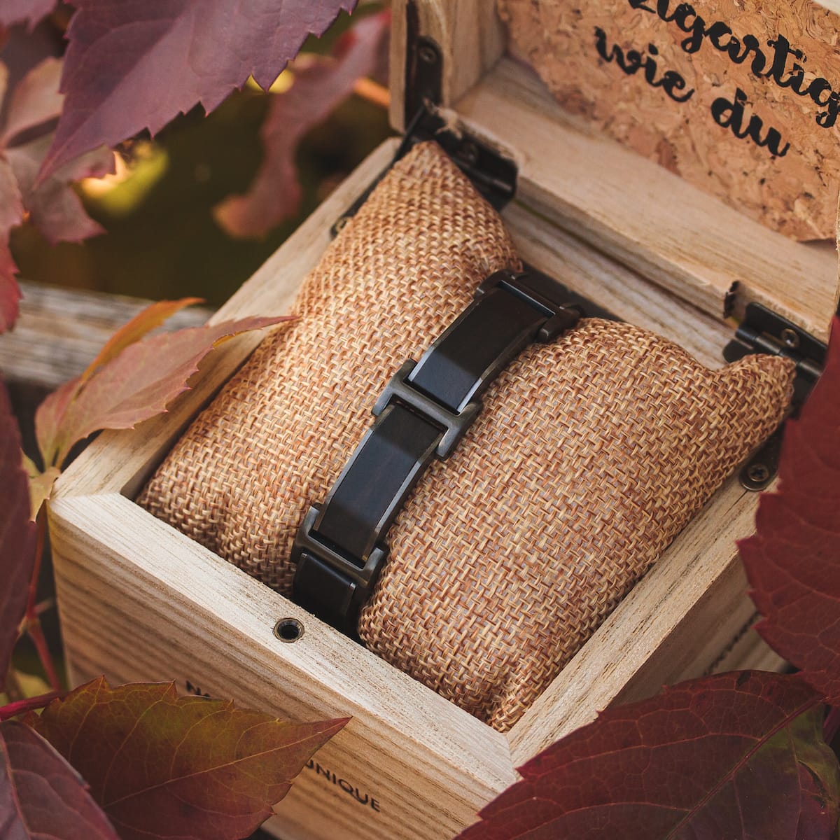 "Acapella" watch, crafted in Leadwood and dark grey, presented in a rustic, natural style wooden box.
