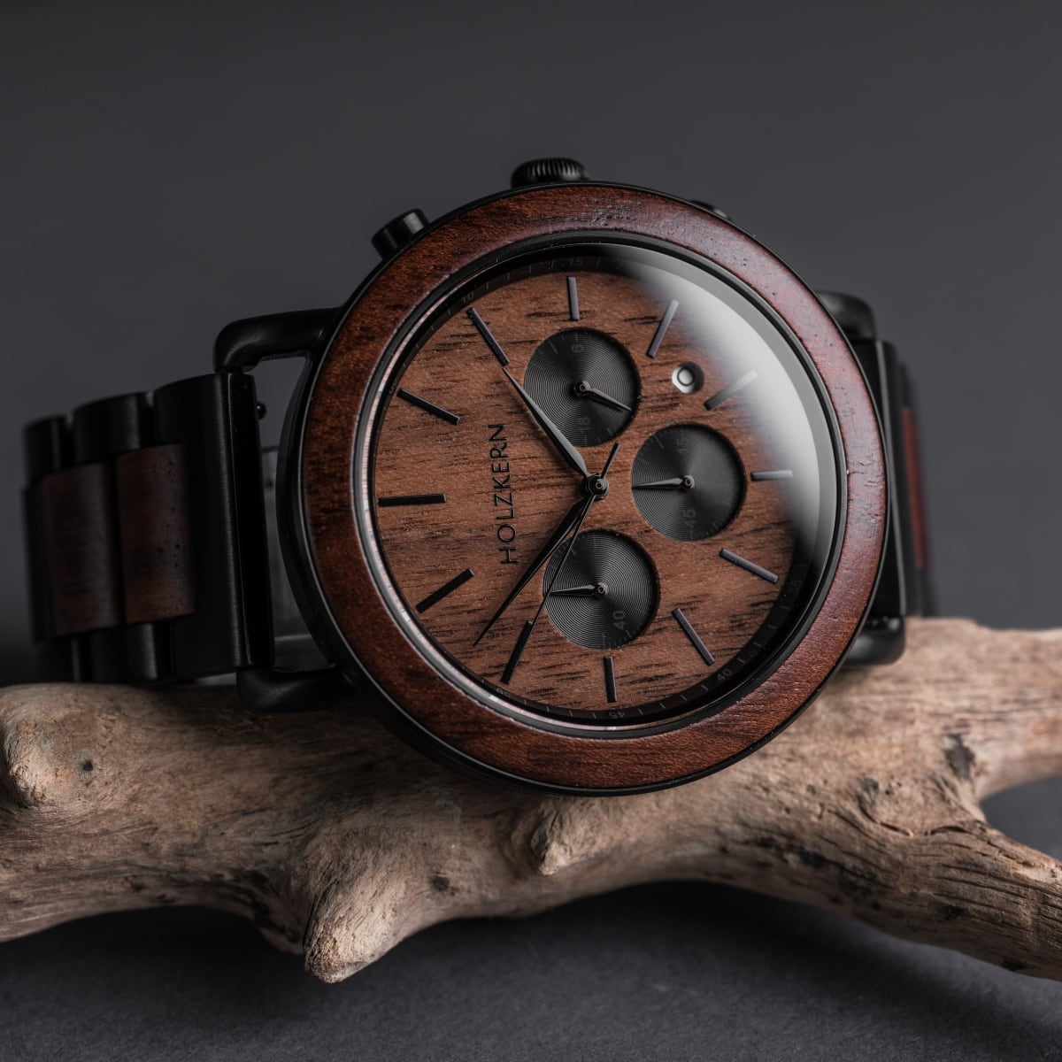 "Dusk" watch, crafted in walnut and black, showcasing a sleek, natural aesthetic.