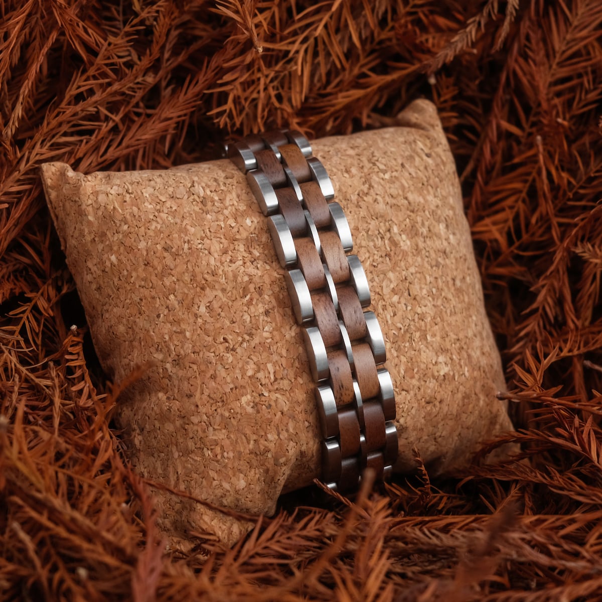"Kanon" bracelet featuring a walnut and silver finish with an elegant, natural style.