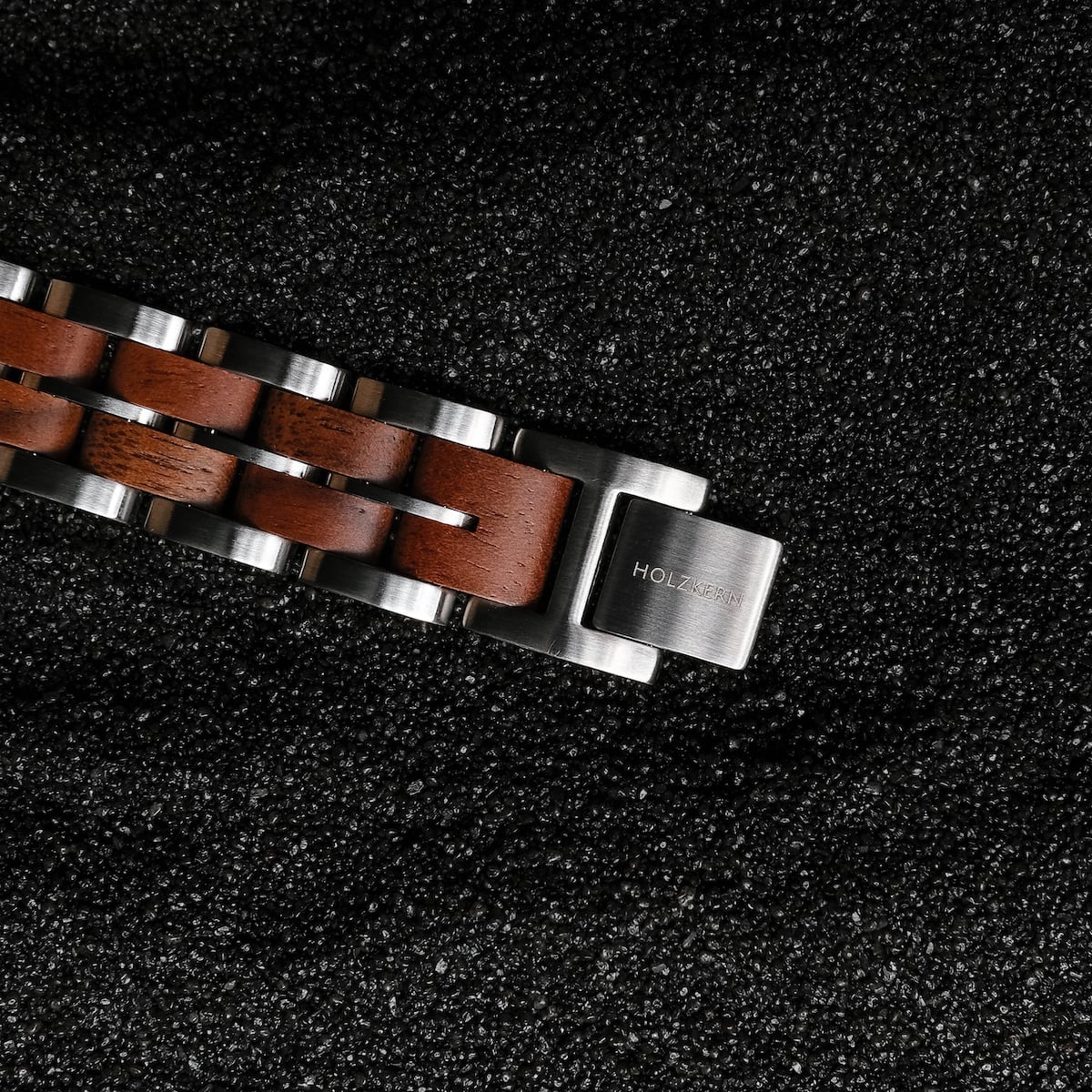 "Kanon" watch bracelet, featuring a walnut and silver design with a modern, textured style.