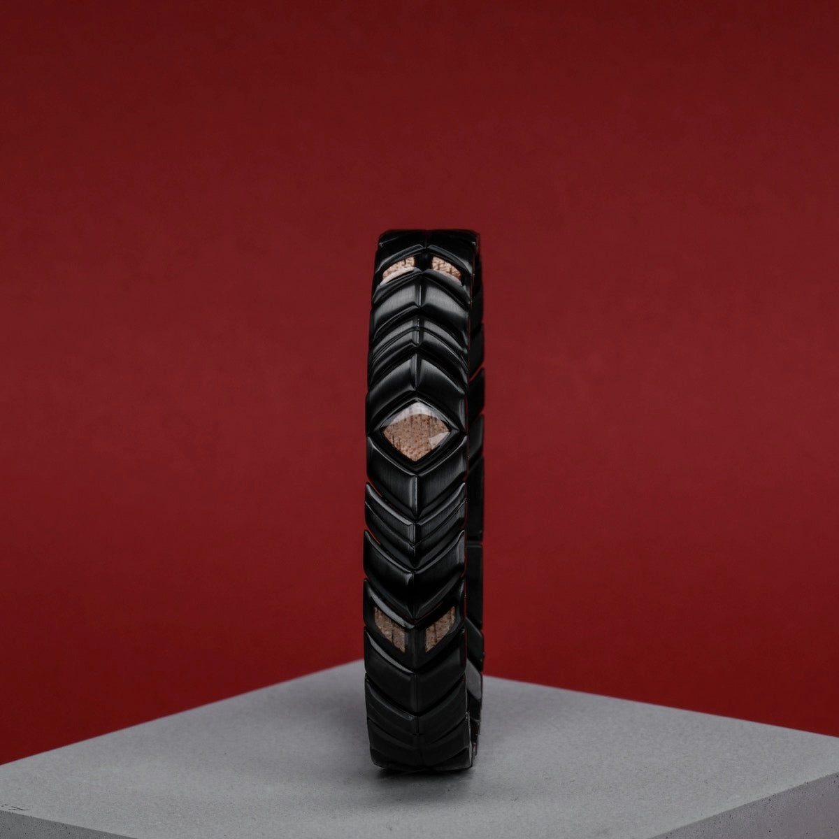 "Prelude" bracelet featuring Koa wood accents and a sleek black design.