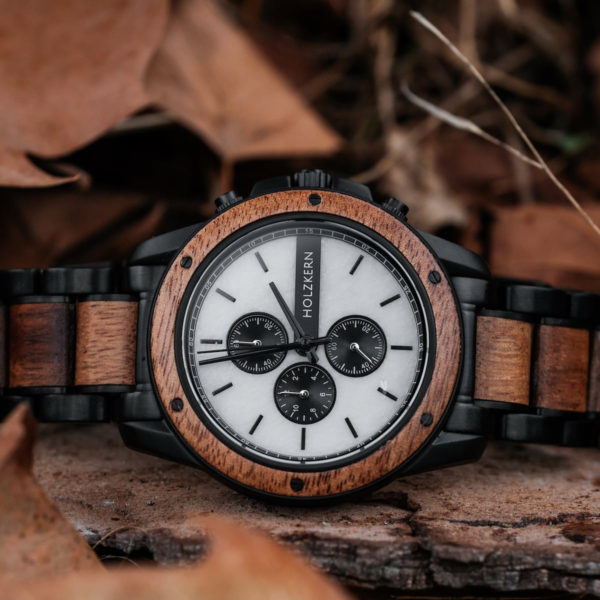 "Lancelot" watch, featuring a teak and marble design, blending elegance with a natural aesthetic.
