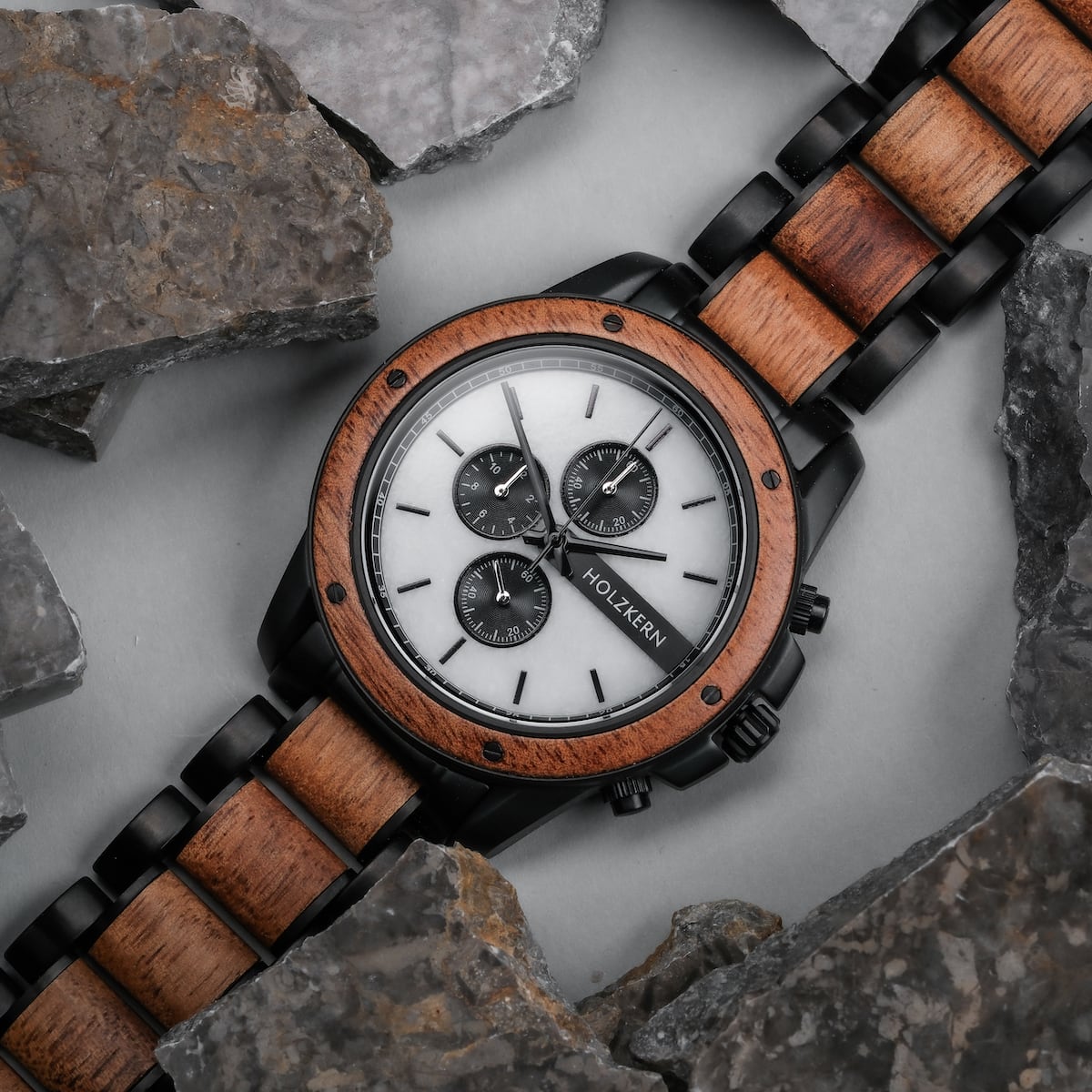 "Lancelot" watch featuring a teak and marble design with a sleek, modern aesthetic.