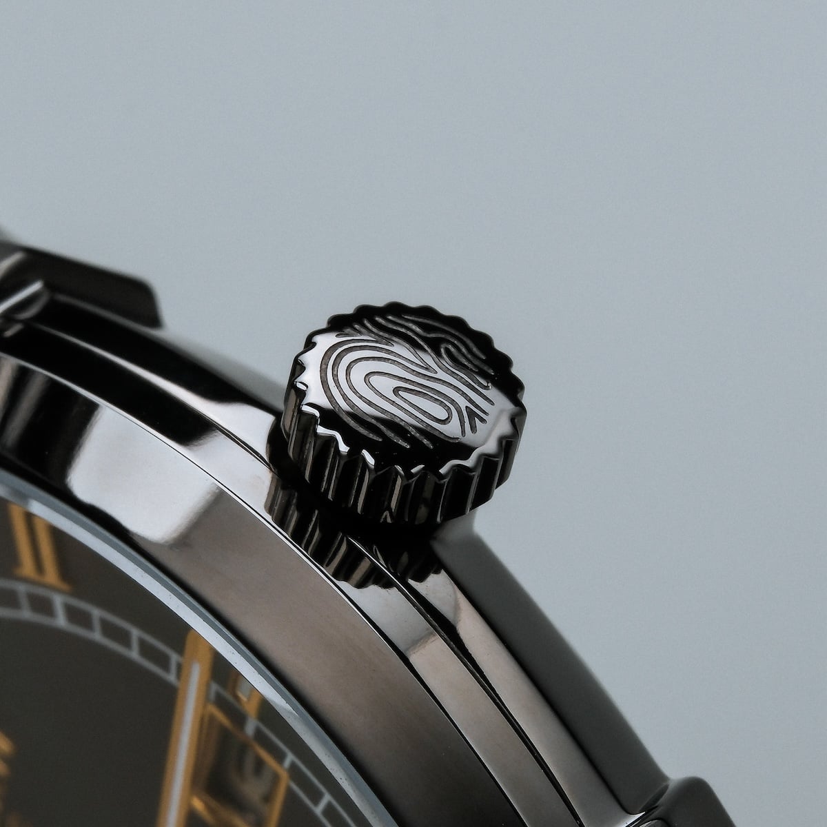 "Milestones" wristwatch featuring a sleek nacre and dark gray style.