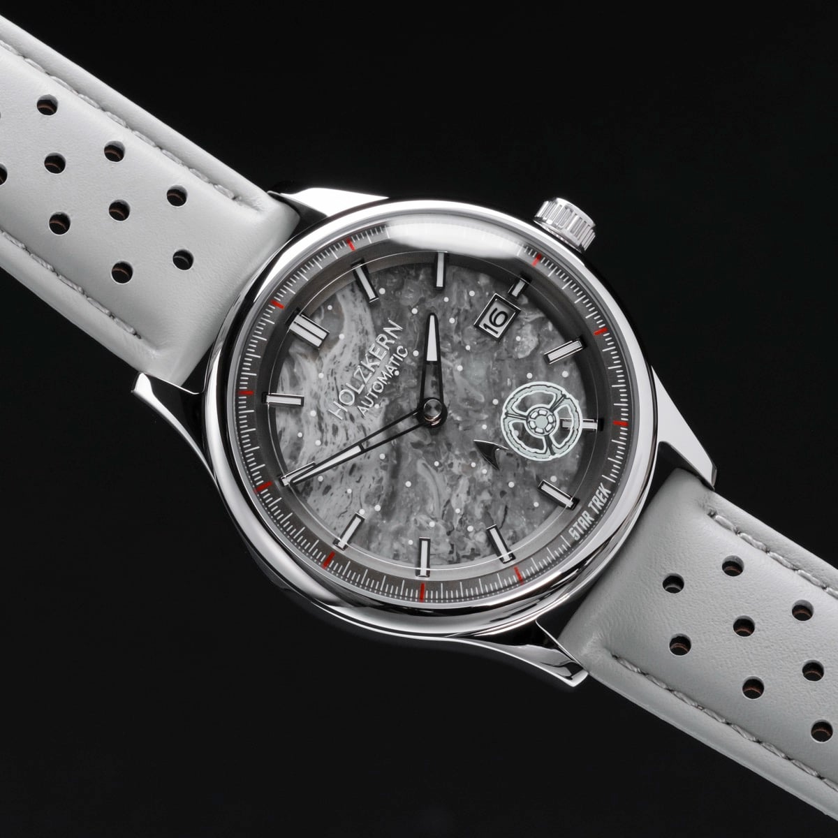 "DS9", wristwatch, featuring a marble-style face and light gray leather strap.