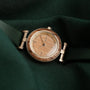 "Laura" watch, featuring a Zebrawood and Oak design with a natural, elegant style.
