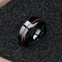 "Sumo Ring": Elegant walnut and ceramic ring featuring a sleek, modern design.