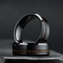 "Sumo Ring" walnut and ceramic ring with sleek modern style.