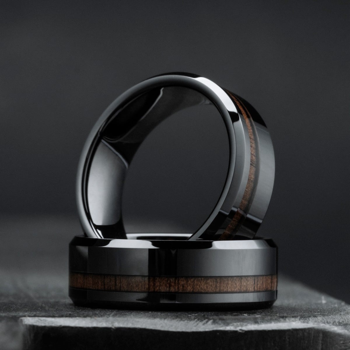 "Sumo Ring" walnut and ceramic ring with sleek modern style.