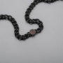 Collana "Bodyguards Collane" con accenti in noce e argento antico, che mostra un design elegante e moderno.