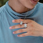 "Silverstream Necklace necklace featuring diopside and silver design, worn elegantly with a matching ring."