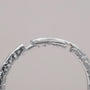 "Silverstream Ring ring, featuring a textured silver design with a modern, elegant style."