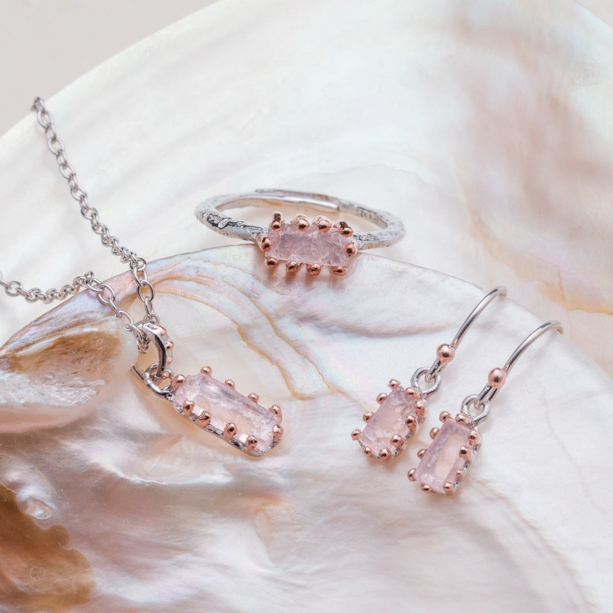 "Silverstream Ring ring featuring rose quartz in a rosegold setting, showcasing an elegant, natural style."