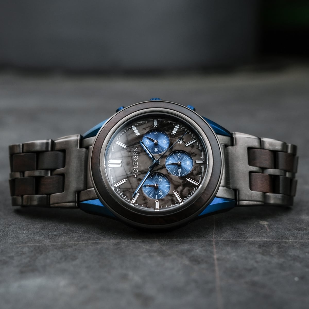 "Intergalactic watch with leadwood and marble materials, featuring a sleek and modern design."