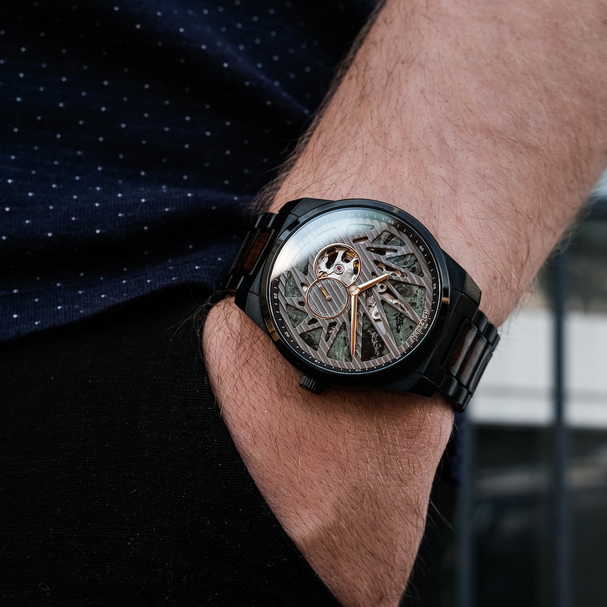 "Adrenin, elegant watch with a Cat's Eye and Walnut design, worn on the wrist."