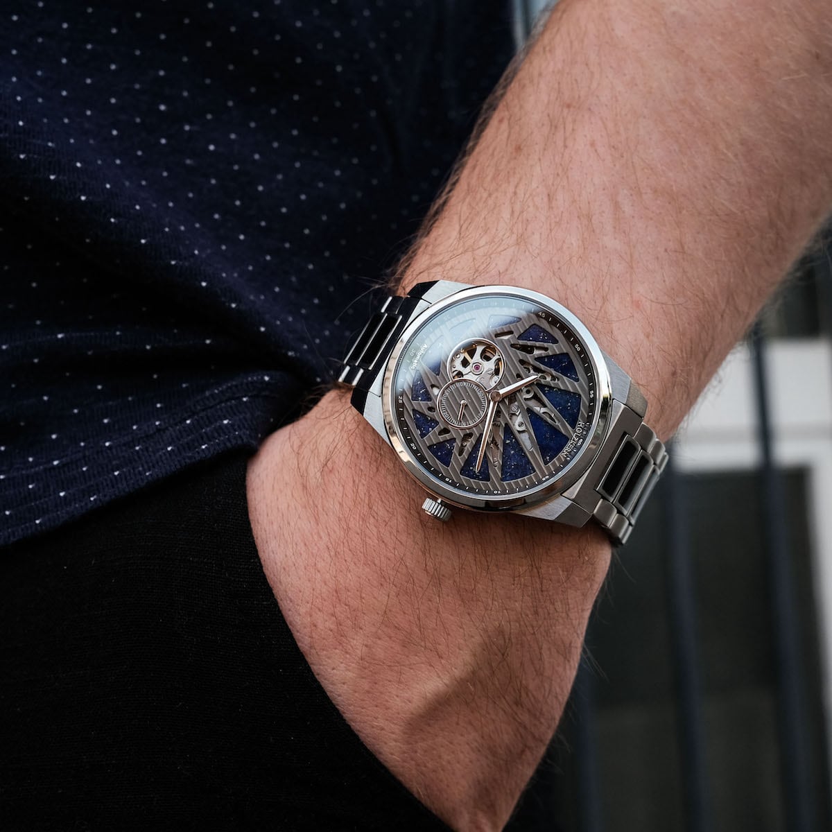 "Spikes watch featuring a lapis lazuli and maple design with a sleek, modern style."