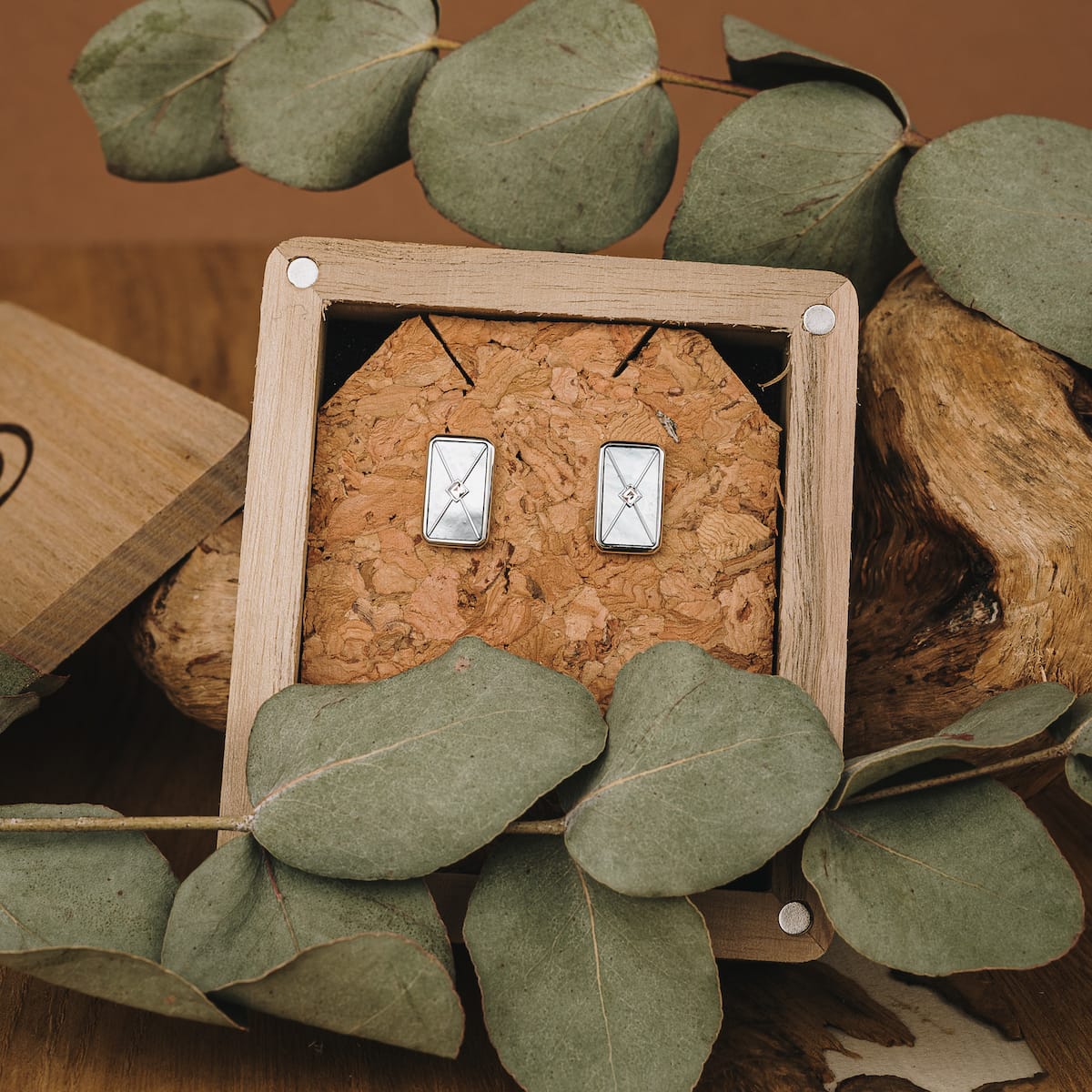 "Aquarell Earrings" earrings in white nacre and silver, featuring a modern rectangular design.