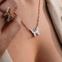 "Fritillary Necklace" butterfly necklace in nacre and rose gold, featuring an elegant and stylish design.