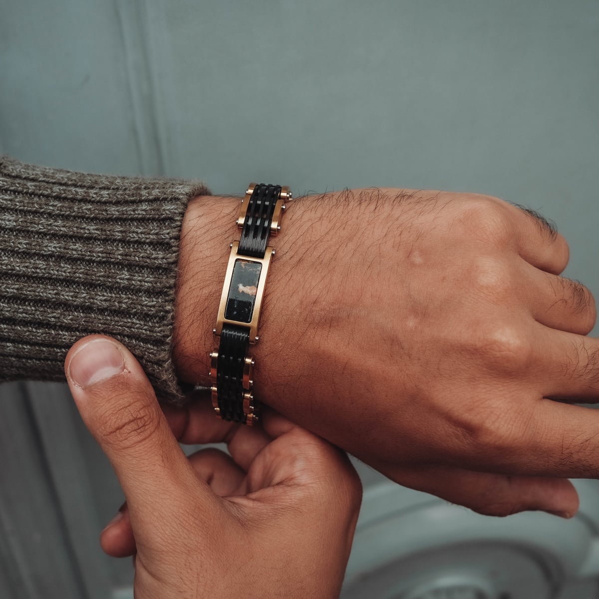 "Adagio" watch, featuring a sophisticated marble and gold design, worn on wrist for a stylish look.