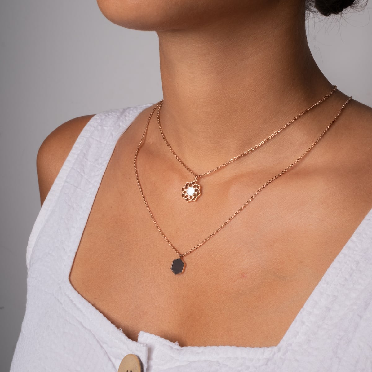 "Jewelry Extender" jewelry extender, elegant rosé style, showcased on a layered necklace.