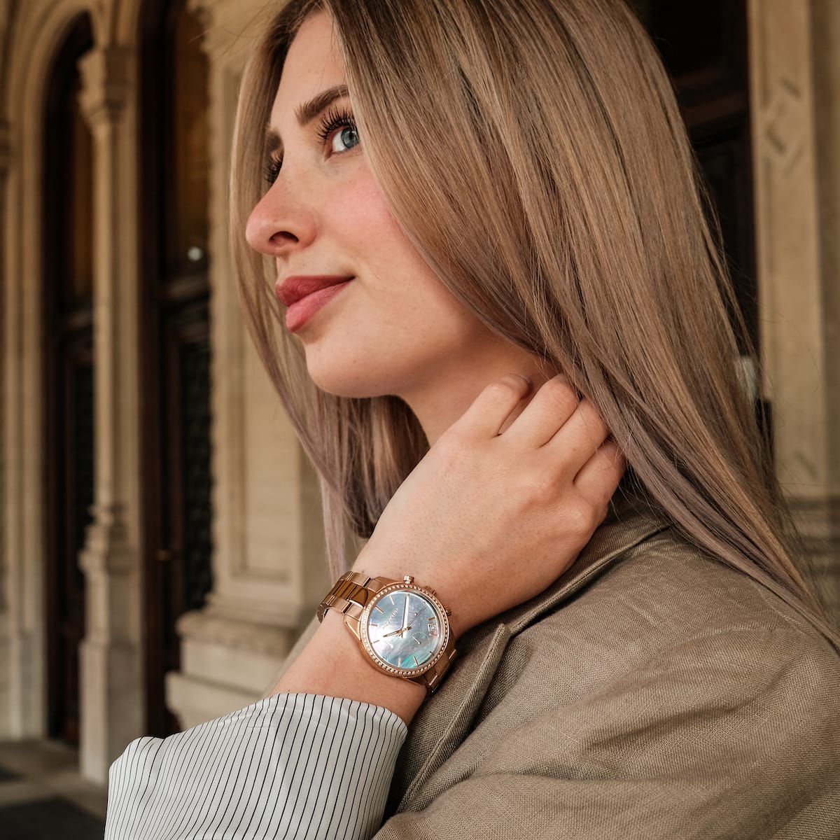 "The Passionate – elegant watch featuring a nacre dial and rose gold accents."