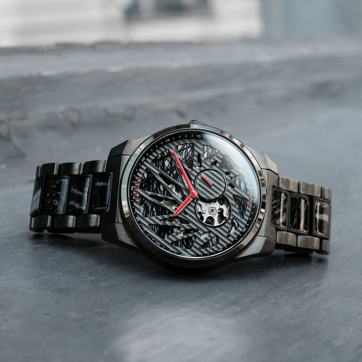 "Pacemaker watch featuring a marble-inspired design with intricate details and a modern style."