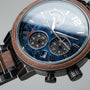 "Syntonize" watch with a Sodalite dial and Walnut accents, featuring a sleek and elegant design.