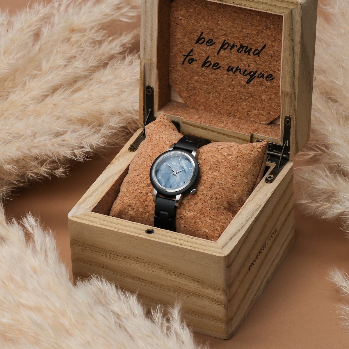 "Big Sur" watch with maple and nacre design in a wooden box, showcasing elegant craftsmanship.