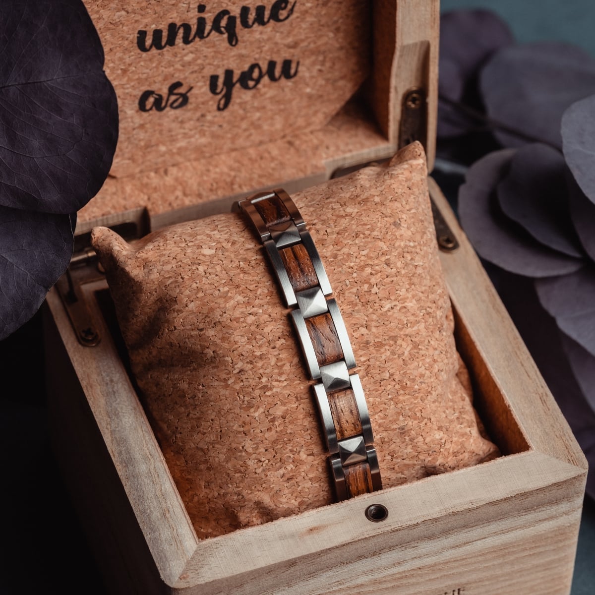 "Rhapsody" bracelet featuring zebrawood and silver accents, showcasing a stylish and natural aesthetic in a wooden box.
