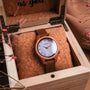 "Cinque Terre watch featuring cherrywood case and nacre dial with a rustic yet elegant design."