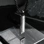 Collana "Planarity Collana" presenta un design elegante e moderno con elementi in marmo e grigio scuro.
