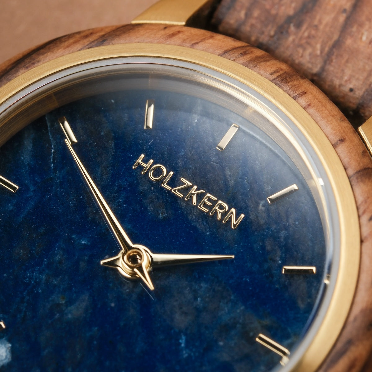 "Balos" watch featuring zebrawood and marble with a sophisticated and natural design.