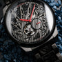 "Pacemaker wristwatch with marble accents and intricate design on a textured dial backdrop."
