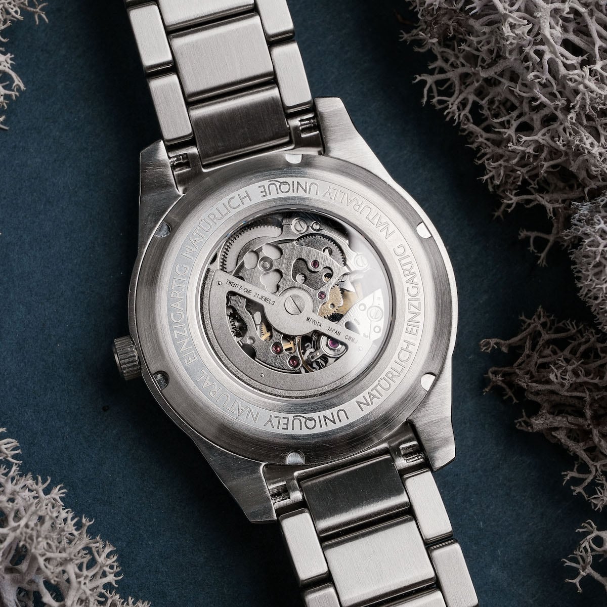 "Spikes wristwatch with a sleek mechanical design and stainless steel band."