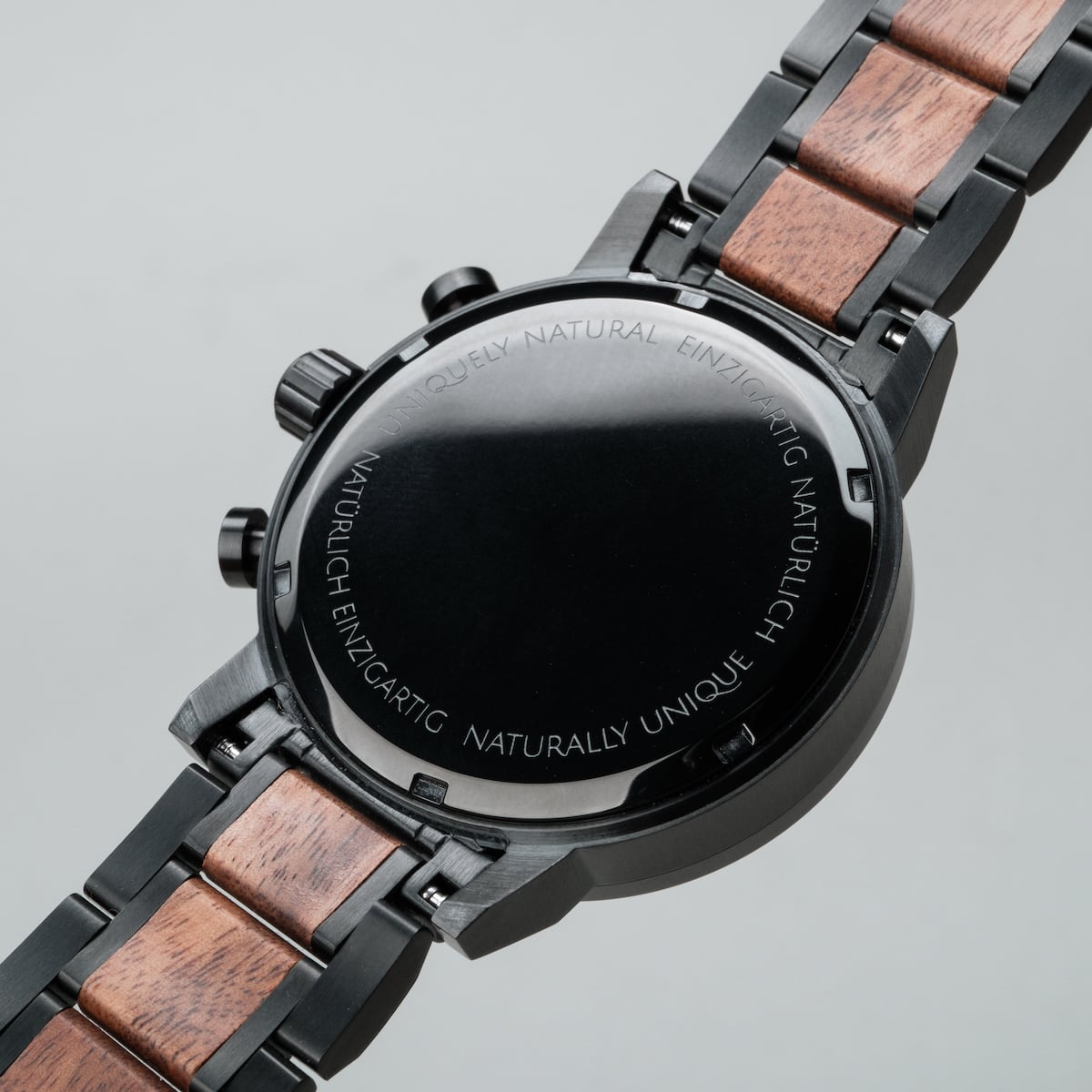 "Scattered" watch featuring a modern design with marble and koa wood accents.