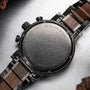 "Syntonize" watch featuring a sophisticated blend of sodalite and walnut with a sleek, modern design.