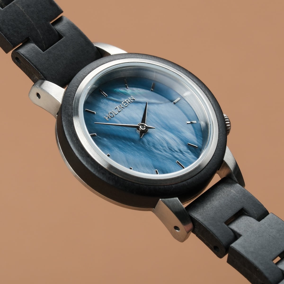 "Big Sur" watch featuring a distinctive maple and nacre design with a sleek, modern aesthetic.