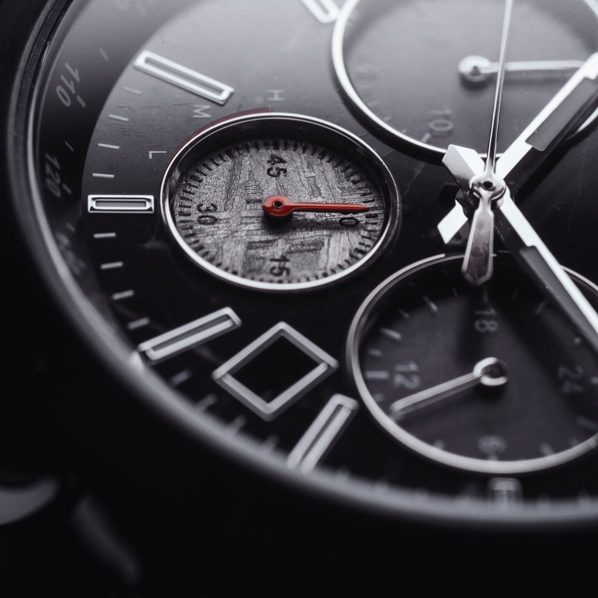 "Rahotu", a sophisticated wristwatch with a marble-black design and intricate dial details.